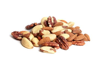 Mixed nuts isolated on white background. Almonds, Brazil nuts and peeled pecans mix. Assortment of nuts, a wholesome snack mix