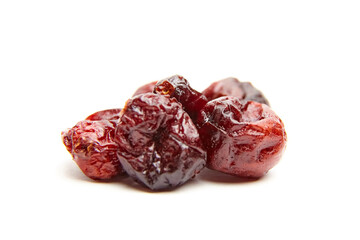 Obraz premium Dried cranberries isolated on white background. Sweet red berries closeup