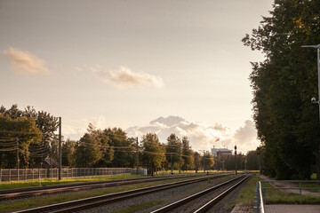 Fototapeta na wymiar Picture of the tracks of latvian railways in Sigulda, Latvia, at dusk.