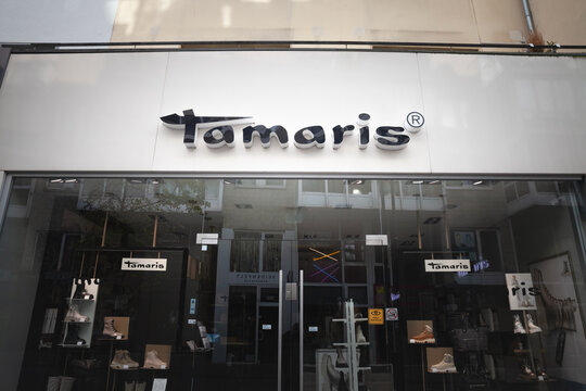 Picture of a sign with the logo of tamaris Germany on their main store for Cologne. Tamaris is a German manufacturer and retailer of and women's shoes.