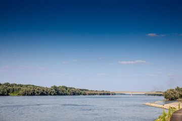 Picture of the danube on a panorama in Ilok, croatia, with the ilok backa Palanka bridge behind. The Ilok–Bačka Palanka Bridge or the 25 May Bridge crosses the Danube at its 1297th kilometer, connecti