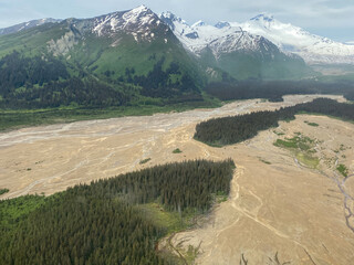 Red River flowing from Red Glacier on Mount Iliamna Volcano in Lake Clark National Park and...