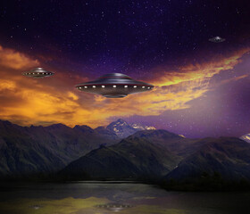 UFO. Alien spaceships flying over mountains. Extraterrestrial visitors © New Africa