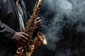 Close-up of a musician's hands playing a saxophone, surrounded by wisps of smoke