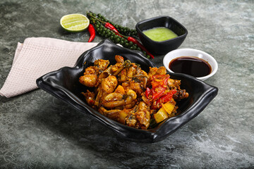 Vietnamese cuisine - fried frog with vegetables