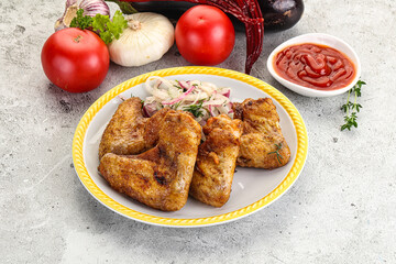 Grilled chicken wings with sauce