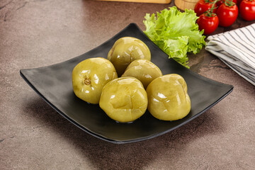 Homemade pickled green tomato appetizer