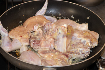 frying pan with chicken