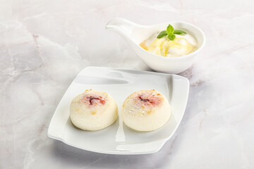 Curd pancakes with sour cream