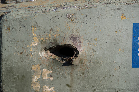 Detail of a shell hole in an M4 Sherman AUSTERLITZ tank Chrysler A57 30 cylinder multibank engine