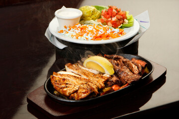 Asian cuisine. Meat with rice 