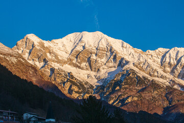 Mount Canin, Julian Alps, at sunset.
Warm light, planes, rocks and snow