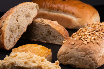 assorted cut breads on black table natural fermentation