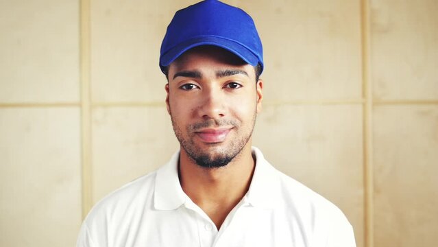 Baseball, cap and face of man in sport on wall, background or studio with a smile. Happy, athlete and portrait of person with confidence, pride and ready for softball, competition or Mexico mock up