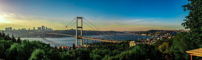Istanbul Bosphorus panoramic photo. Istanbul landscape beautiful sunset with clouds Ortakoy Mosque, Bosphorus Bridge, Fatih Sultan Mehmet Bridge Istanbul Turkey.Best touristic destination of Istanbul