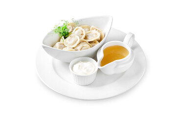 Siberian dumplings with meat, sour cream and broth. Lunch. Isolated.