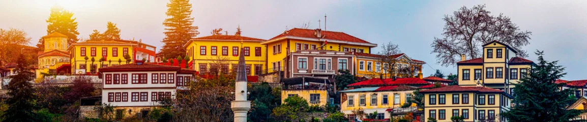 Papier Peint photo Vieil immeuble The historical Ortamahalle in Trabzon's Akçaabat district attracts attention tourists with its Ottoman houses, mansions, cobbled streets, fountains and neighborhood culture as a whole.
