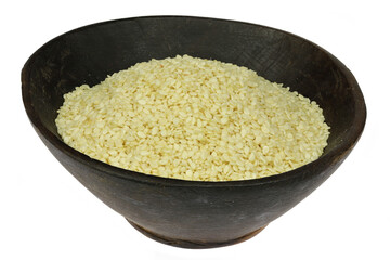 sesame seeds in wooden bowl isolated on white background