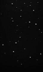 Fototapeta premium Snow overlay texture against black background