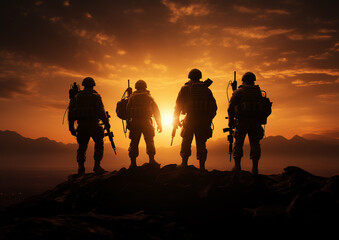Silhouette of a group of Soldiers at sunset