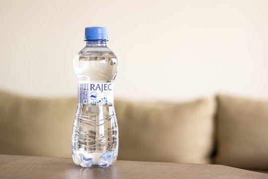 Plastic bottle of Rajec spring water in kitchen