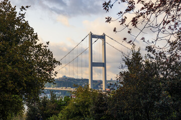 Naklejka premium Bosphorus Bridge aka 15th July Martyrs' Bridge view at sunset from Nakkastepe