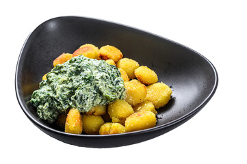 Fried gnocchi potato pasta with spinach.   Isolated, Transparent background. 