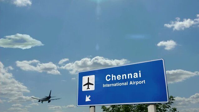 Chennai India Jet plane landing. City arrival with airport direction sign. Travel, business, tourism and airplane transport concept.