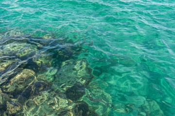 Naklejka na ściany i meble high angle view of a clear turquoise sea water