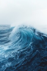 A powerful and towering wave in the vast ocean. Perfect for capturing the beauty and strength of nature.