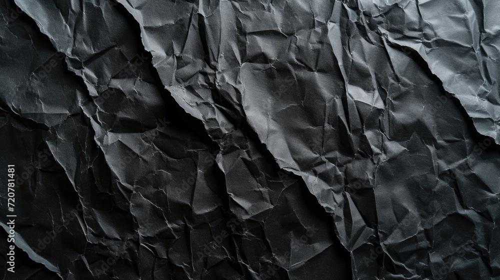 Aufkleber A close-up view of a piece of black paper. This versatile image can be used for various design projects