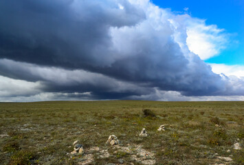 A powerful front of thunderclouds in the Crimea over the Tarkhankut steppe