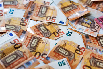 Euro banknotes money (EUR), currency of the European Union.
Euro banknotes of different denominations on a white background close-up