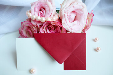 Happy Valentine's Day greeting card. large bouquet of roses and red heart on a white background. space for text	