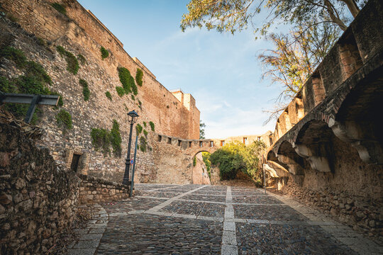 a cobbled street at the entrance to the medieval castle of the Suda in Tortosa, comarca of Baix Ebre, Province of Tarragona, Catalonia, Spain