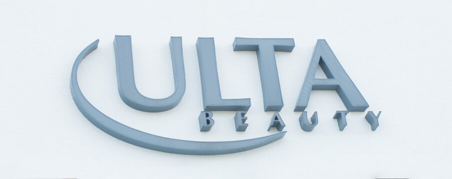 Ocala, Florida US - January 22, 2024 Trendy Ulta beauty is a chain of cosmetic, makeup and perfume stores, high-end and low-end cosmetics, fragrances, nail products outside entrance sign facade logo