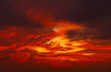 Attractive dramatic red sunset with cloudy sky