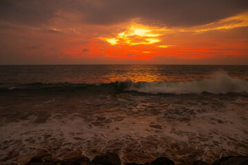 Attractive dramatic red sunset with cloudy sky