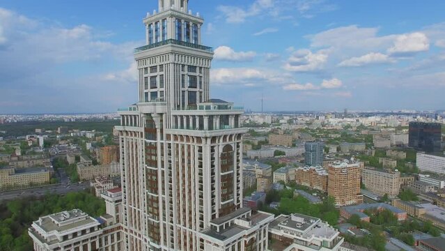 Exterior of skyscraper Triumph-Palace and cityscape with traffic