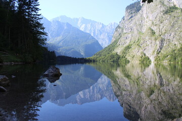 Königssee mirror lake green and mountains in the back