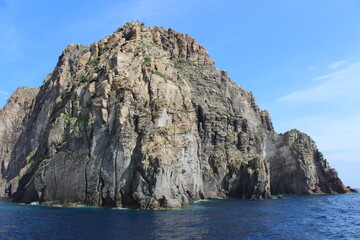 lagoon close to sicily and stone cliff