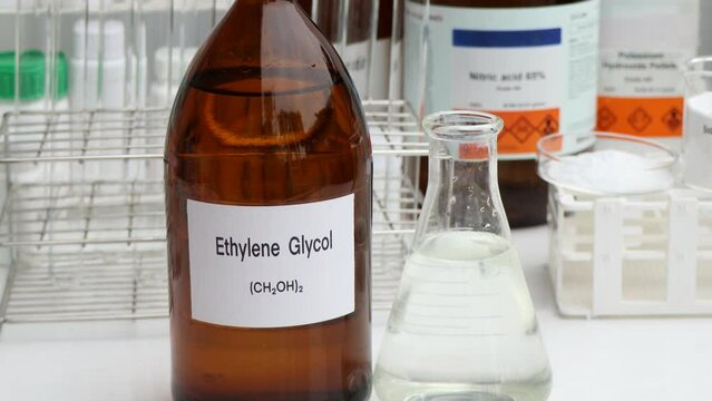 Ethylene Glycol in container, chemical analysis in laboratory, chemical raw materials in industry 