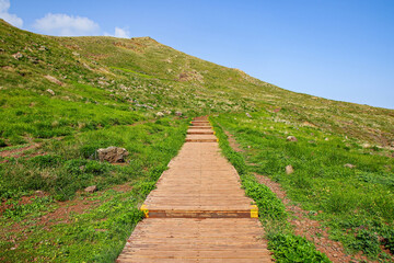Fototapeta na wymiar Boardwalk on the trail to the Ponta de São Lourenço (tip of St Lawrence) at the easternmost point of Madeira island (Portugal) in the Atlantic Ocean