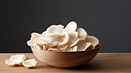 Fototapeta na wymiar Oyster mushrooms in wooden bowl on wooden table and dark background Generative AI