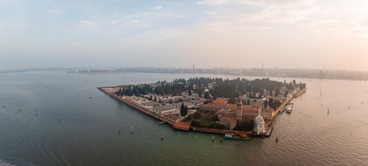 Aerial view of historic Saint Michele cemetery island near Murano and Venice, Italy