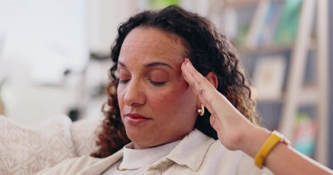 Woman, hand and headache pain or temple stress in apartment for burnout anxiety, brain fog or migraine. Female person, fingers and vertigo fatigue or dizzy head in home for tension, fail or worry