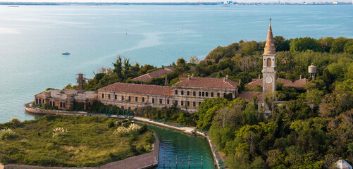 Aerial view of the plagued ghost island of Poveglia in the Venetian lagoon, opposite Malamocco...