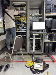 fiber optic cable testing in server room.