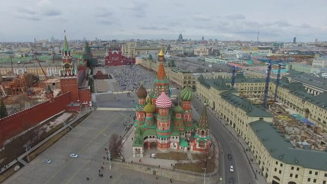 Townscape with crowd of people on red square near Saint Basil Cathedral