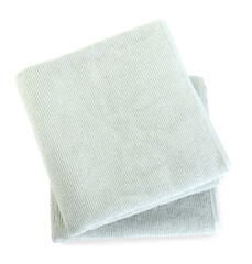 Soft folded towels isolated on white, top view